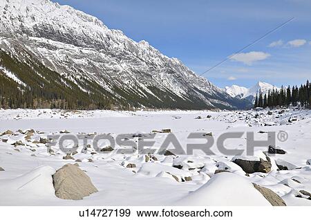 Stock Photo -  nature winter snow covered scenic medicine lake. Fotosearch