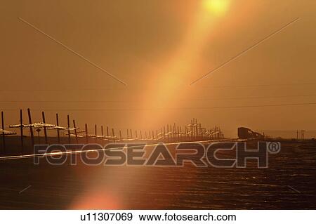 nature winter train tracks sunset canada yellow View Large Photo Image Stock Photo - nature winter train tracks sunset canada yellow. Fotosearch
