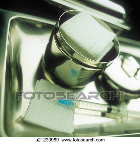 Stock Photo -  office doctor hypodermic syringe in clean clinic. Fotosearch