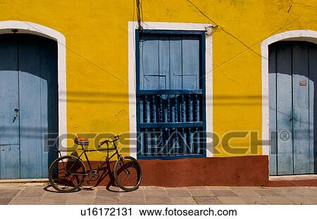 Stock Image -  old yellow building in colonial town trinidad. Fotosearch