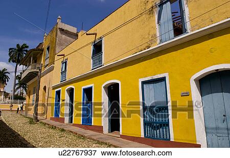 Stock Photo -  old yellow building in colonial town trinidad. Fotosearch