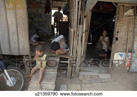 Stock Image -  people cambodia shanty dwellings anlon knang a. Fotosearch