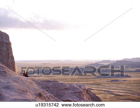 Stock Image -  people couple visitors pause take in views park. Fotosearch