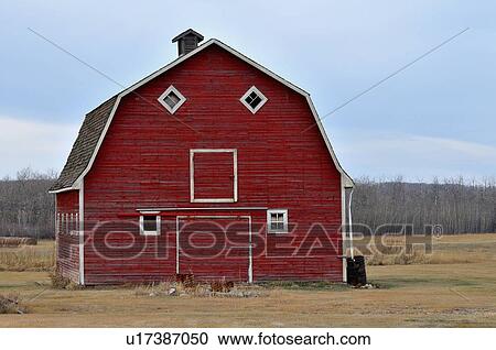 red barn stands farm in alberta canada day View Large Photo Image Stock Image - red barn stands farm in alberta canada day. Fotosearch