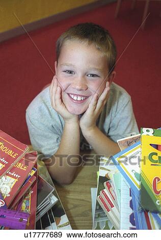 Stock Photo -  school first day ready for boy portrait blessed. Fotosearch