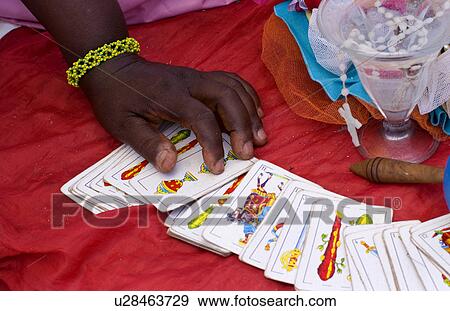 spiritual tallow card reading santeria religion View Large Photo Image Stock Photo - spiritual tallow card reading santeria religion. Fotosearch