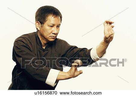 Stock Image -  sport man closeup mature practicing martial arts. Fotosearch