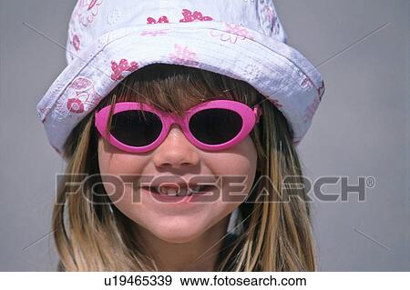 Stock Photo -  summer girl child sun close up portrait young . Fotosearch
