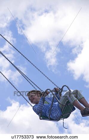 summer girl sun young having fun swing ride park View Large Photo Image Stock Image - summer girl sun young having fun swing ride park. Fotosearch