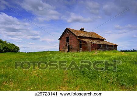 Stock Image -  summer horozontal image old abandoned red barn. Fotosearch
