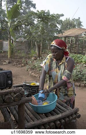 Stock Photo -  sun home uganda in najjemba teopista farmer woman . Fotosearch