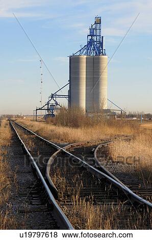 tall concrete grain storage elevator sitting View Large Photo Image Stock Photo - tall concrete grain storage elevator sitting. Fotosearch
