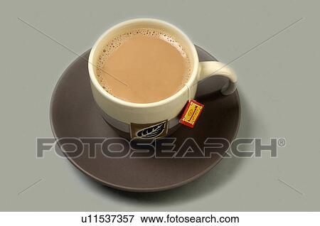 Stock Photo -  tea milk cup beverage bag hot horizontal plate. Fotosearch