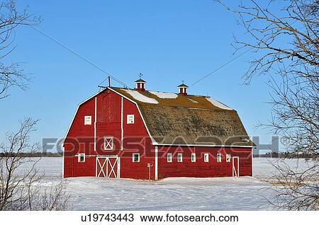 Stock Image -  tree winter horozontal scenic red barn in rural. Fotosearch
