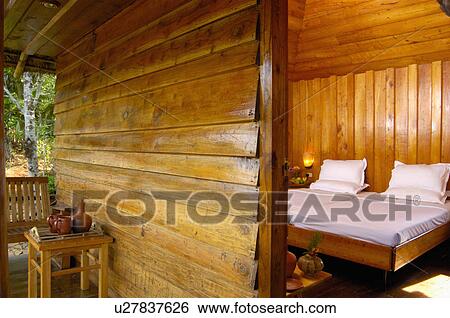 Stock Photograph -  vagamon resorts idukki dist bed cottages pillows. Fotosearch
