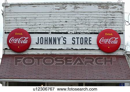 Stock Photo -  vintage shot sign front country store in rural alberta. Fotosearch