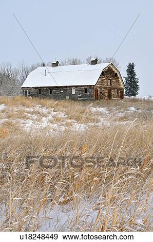 Stock Photo -  vintage winter image large barn in state decay. Fotosearch