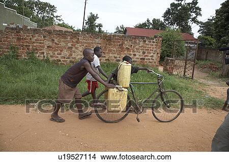 water child children uganda boys carrying mukono View Large Photo Image Picture - water child children uganda boys carrying mukono . Fotosearch
