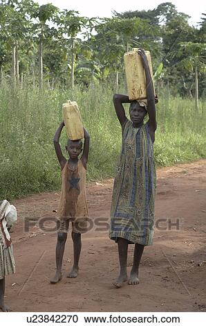 water child children uganda carrying in jerry cans View Large Photo Image Stock Image -  water child children uganda carrying in jerry cans. Fotosearch