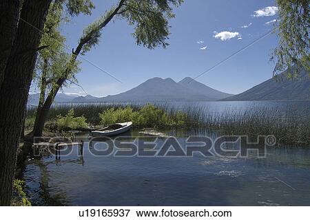 Stock Photo -  water guatemala lake atitlan in early morning la . Fotosearch