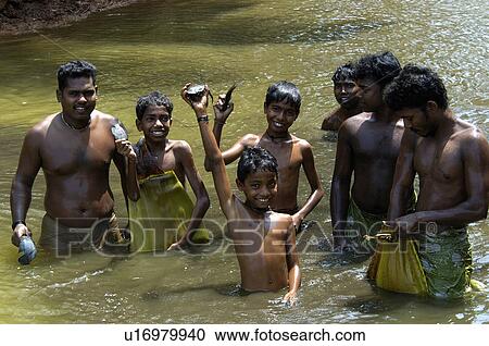 water people man fish children village boys View Large Photo Image Stock Image - water people man fish children village boys . Fotosearch