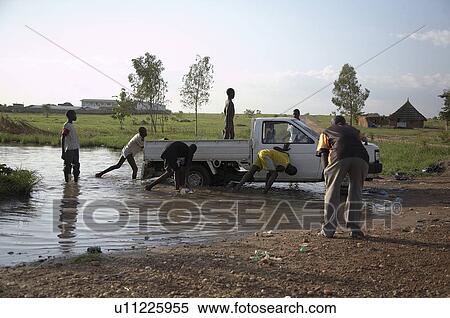 water people south sudan washing truck juba View Large Photo Image Stock Photography - water people south sudan washing truck juba . Fotosearch