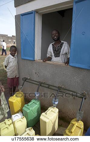 Stock Photo -  water uganda manelling safe drinking nakifuma . Fotosearch