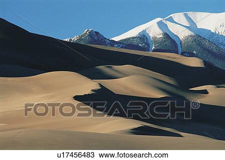 winter great sand dunes mottled color View Large Photo Image Stock Image - winter great sand dunes mottled color . Fotosearch