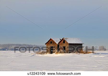 Stock Photo -  winter horozontal scenic two old type wooden. Fotosearch