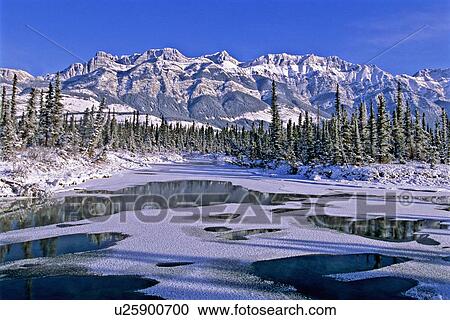 Stock Image -  winter landscape snowcapped miette mountain day. Fotosearch