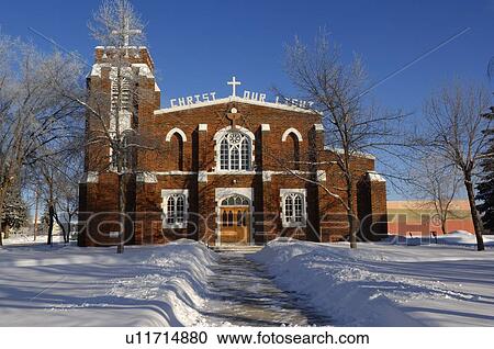 Stock Image -  winter scenic catholic church in town legal. Fotosearch