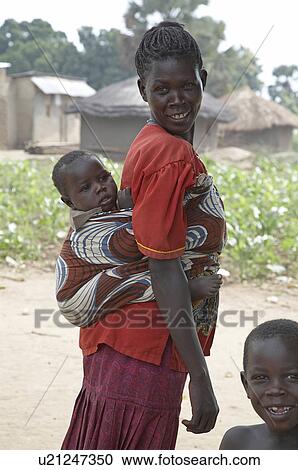 Stock Image -  woman baby child face children women south sudan . Fotosearch