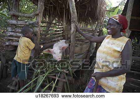 Stock Image -  woman child children home women uganda in farmer . Fotosearch