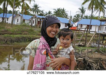 Stock Photography -  woman child children women indonesia crs housing . Fotosearch