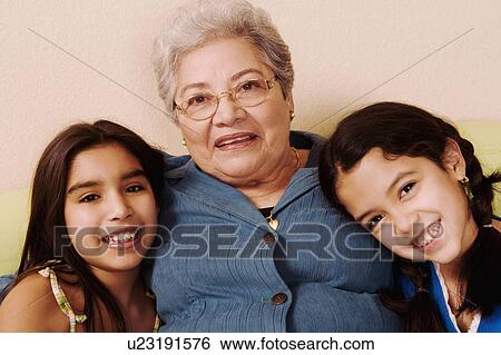 Stock Photograph -  woman child portrait senior sitting two smiling. Fotosearch