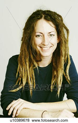Stock Photo -  woman fashion beauty portrait mid adult smiling. Fotosearch