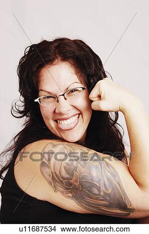 woman fashion tattoo art portrait mid adult 35-39 View Large Photo Image Picture - woman fashion tattoo art portrait mid adult 35-39. Fotosearch