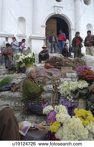 Stock Photograph -  woman flowers guatemala selling in front church . Fotosearch
