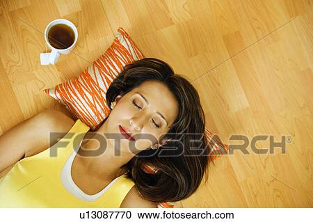 Stock Image -  woman food coffee high angle view mid adult 30-34. Fotosearch