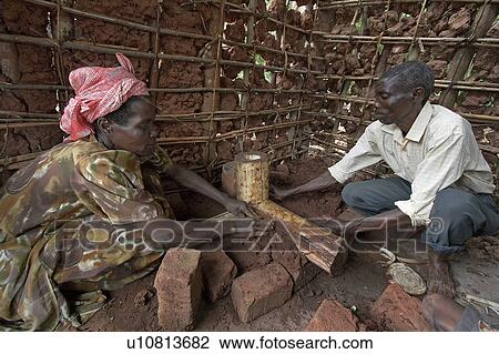 woman food women uganda making mud wood burning View Large Photo Image Stock Image - woman food women uganda making mud wood burning . Fotosearch
