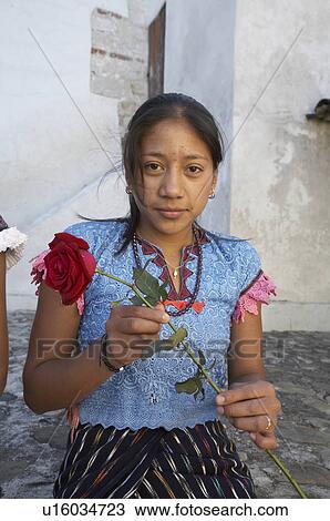 Stock Image -  woman girl rose women guatemala mayan holding el . Fotosearch