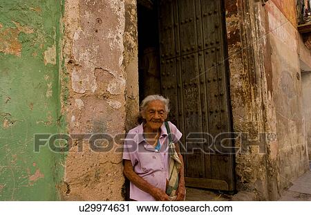Stock Image -  woman havana capitol city cuba local old in mr. Fotosearch