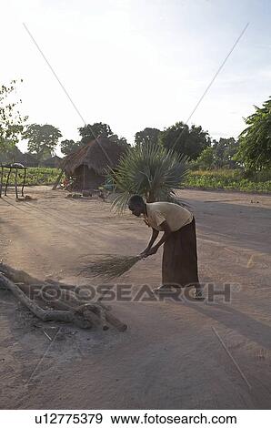 Stock Photo -  woman home women south sudan early morning scene . Fotosearch