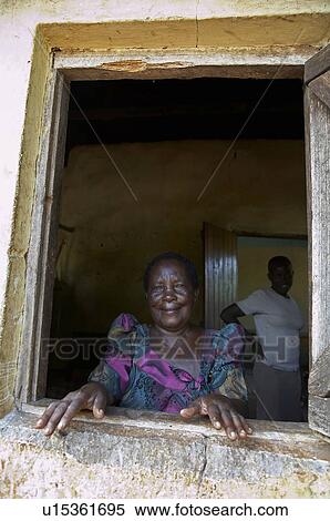 Stock Photography -  woman home women uganda ntanda miria kayunga . Fotosearch