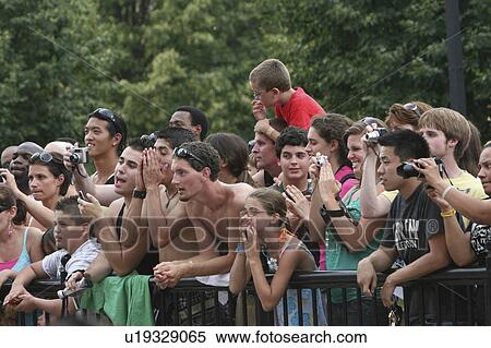 Stock Photography -  woman people children crowd barricade men males. Fotosearch