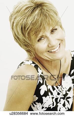 Picture -  woman portrait mature smiling 50-54 years blond. Fotosearch