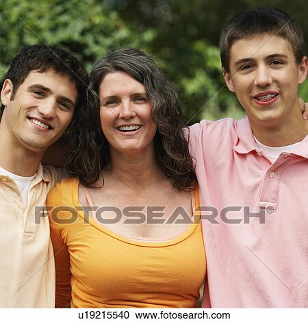 woman portrait mature smiling sons 16-17 years View Large Photo Image Stock Image - woman portrait mature smiling sons 16-17 years. Fotosearch