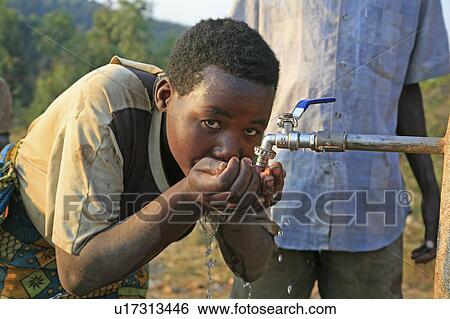 woman water women burundi drinking standpipe sub View Large Photo Image Stock Photograph - woman water women burundi drinking standpipe sub . Fotosearch