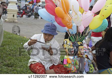woman women cambodia sunday in phnom penh baloon View Large Photo Image Stock Photo - woman women cambodia sunday in phnom penh baloon . Fotosearch