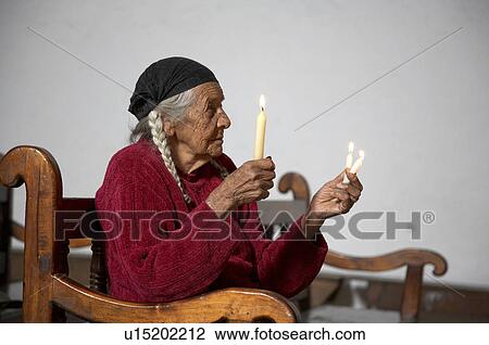 woman women guatemala holding candles in church View Large Photo Image Stock Image - woman women guatemala holding candles in church . Fotosearch
